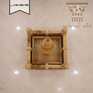 n1020… نافورة حجرية بتدرج كلاسيكي وكرة انسيابية تجمع بين فخامة الرخام وحيوية الماء