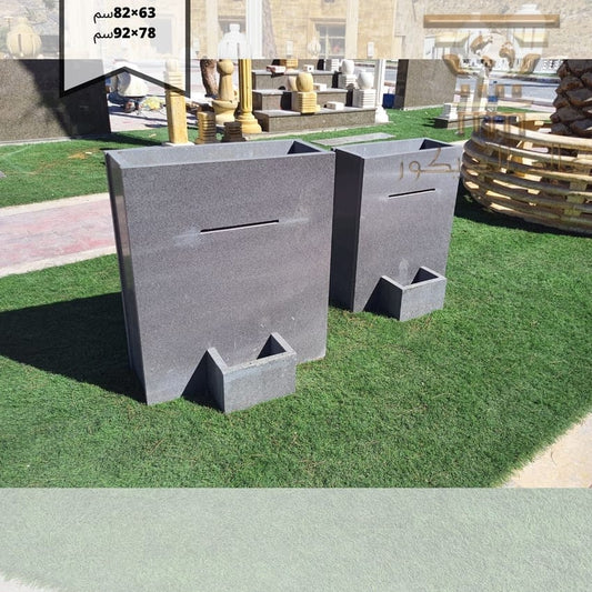 شلال مع قوار من حجر البازلت