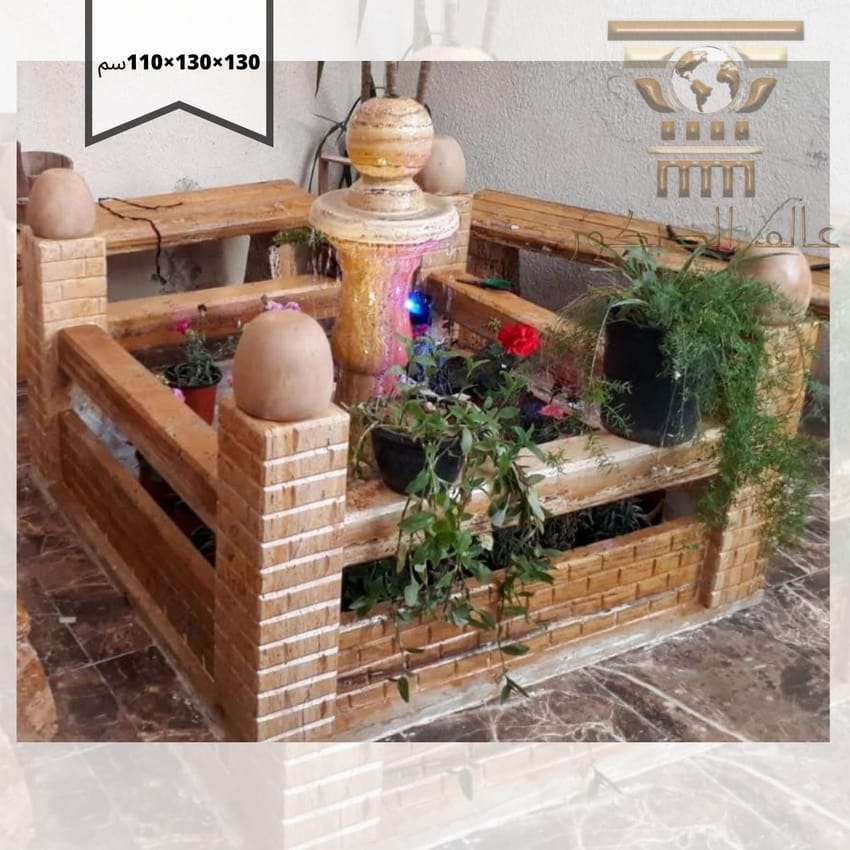 n1031… نافورة حجرية بطابع ريفي دافئ وسور الطوب المتراص لتمنح حديقتك لمسة تراثية ساحرة